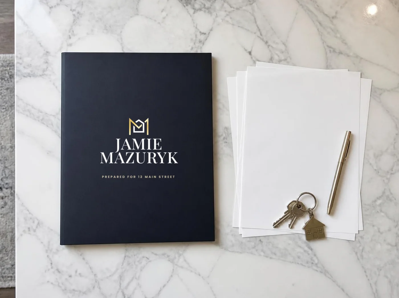 Navy listing presentation folder with the Jamie Mazuryk logo
